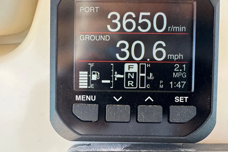  Yacht Photos Pics Dashboard display of a 2009 Mamba 350 showing speed, RPM, and fuel gauge.