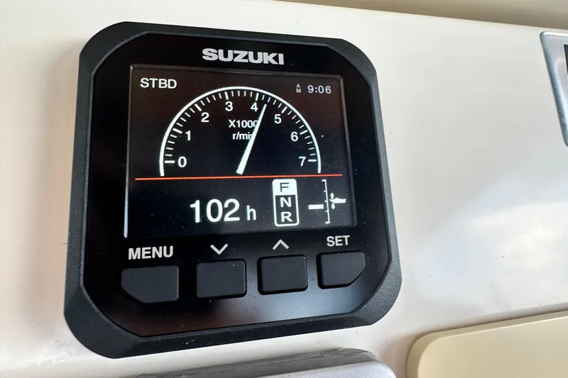  Yacht Photos Pics Digital display showing Suzuki engine hours and RPM on a Mamba 350, 2009 model.