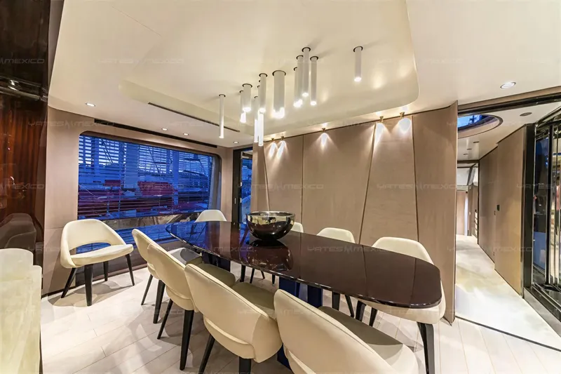 Aleph Yacht Photos Pics Luxurious dining area on 2019 Azimut Grande 27M yacht with elegant lighting and seating.