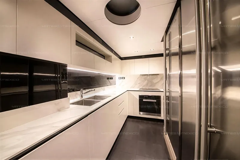 Aleph Yacht Photos Pics Luxurious kitchen interior of 2019 Azimut Grande 27M yacht, featuring modern appliances and sleek design.