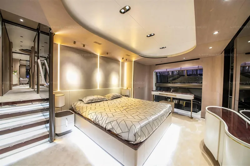 Aleph Yacht Photos Pics Luxurious bedroom interior of 2019 Azimut Grande 27M yacht with modern design and ambient lighting.