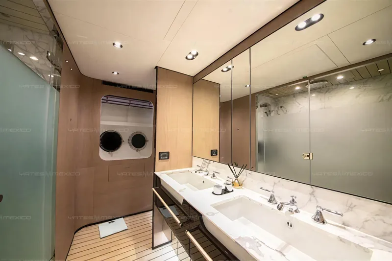 Aleph Yacht Photos Pics Luxurious bathroom interior of 2019 Azimut Grande 27M yacht with dual sinks and modern design.