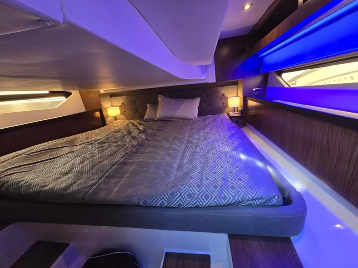 Live It Up Yacht Photos Pics Luxurious cabin interior of 2020 Four Winns V355FX OB with ambient lighting.