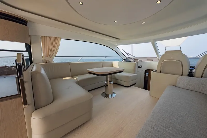  Yacht Photos Pics Luxurious interior of 2023 Azimut Fly 53 yacht with elegant seating and ocean view.