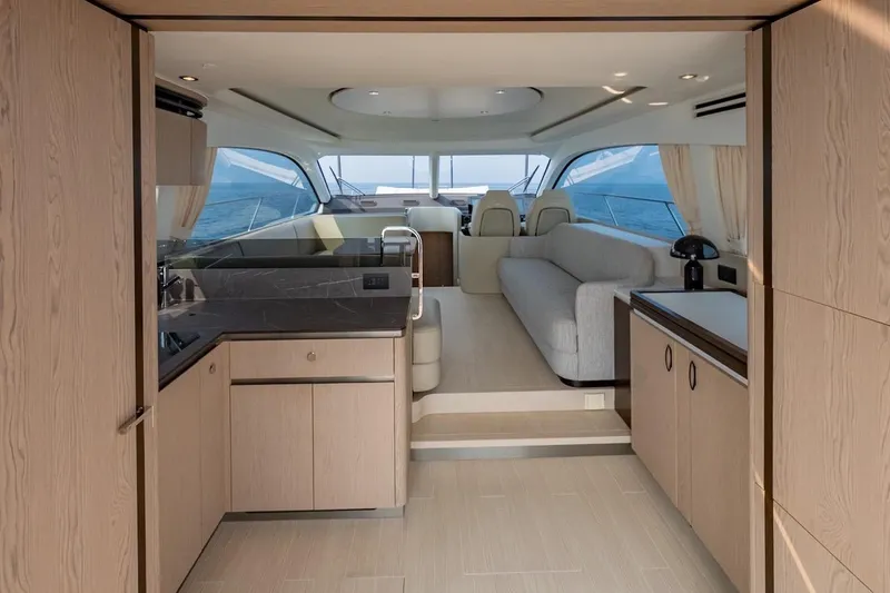  Yacht Photos Pics Luxurious interior of 2023 Azimut Fly 53 yacht with modern design and panoramic windows.