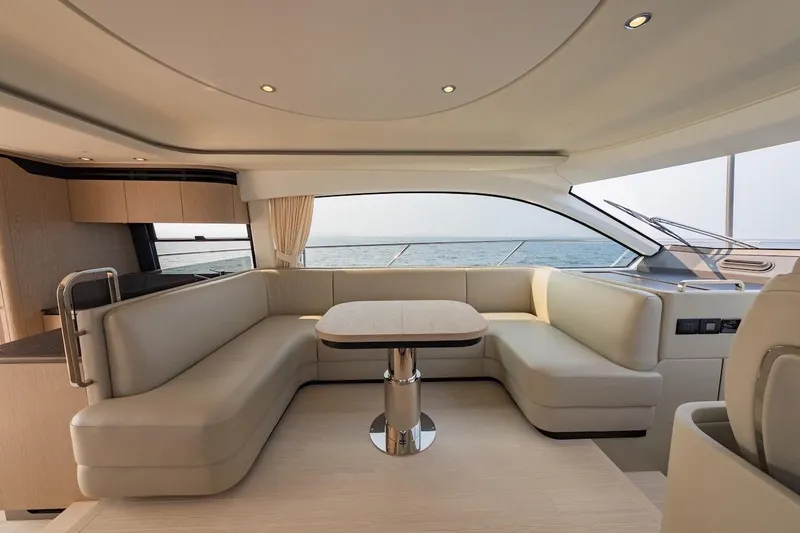  Yacht Photos Pics Luxurious interior of 2023 Azimut Fly 53 yacht with elegant seating and ocean view.