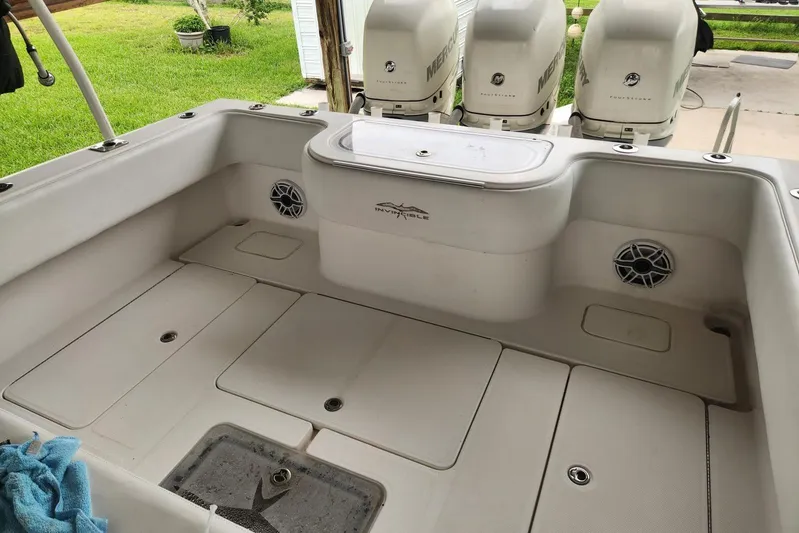  Yacht Photos Pics 2009 Invincible 36 Open Fisherman boat interior with Mercury engines, spacious deck, and storage compartments.