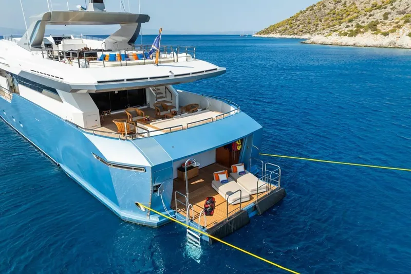 Zig Zag Ocean Yacht Photos Pics Luxurious 2014 Admiral 45 Meters yacht anchored in serene blue waters.