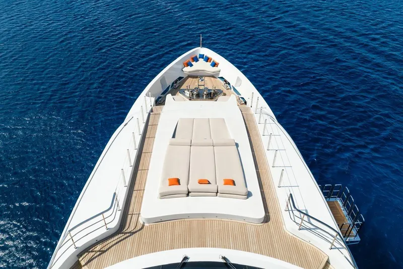 Zig Zag Ocean Yacht Photos Pics Luxurious Admiral 45 Meters yacht deck with sun loungers, 2014 model, on serene blue sea.