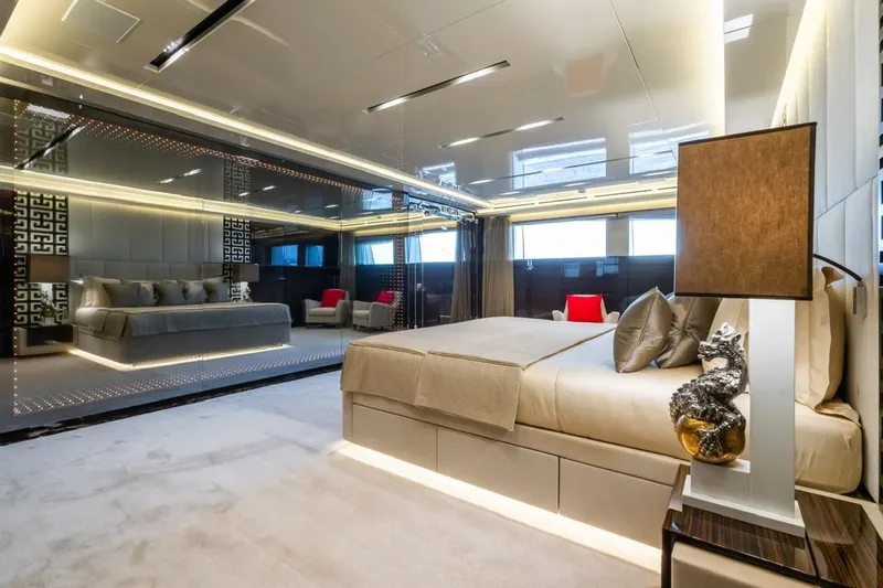 Zig Zag Ocean Yacht Photos Pics Luxurious bedroom interior on 2014 Admiral 45 Meters yacht, featuring elegant decor and modern lighting.