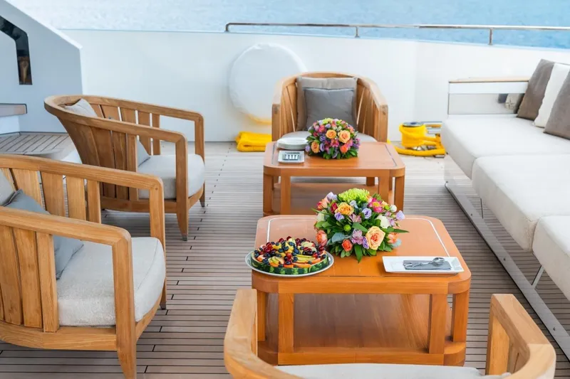 Zig Zag Ocean Yacht Photos Pics Luxurious Admiral 45 METERS yacht deck with elegant seating and floral arrangements, 2014 model.