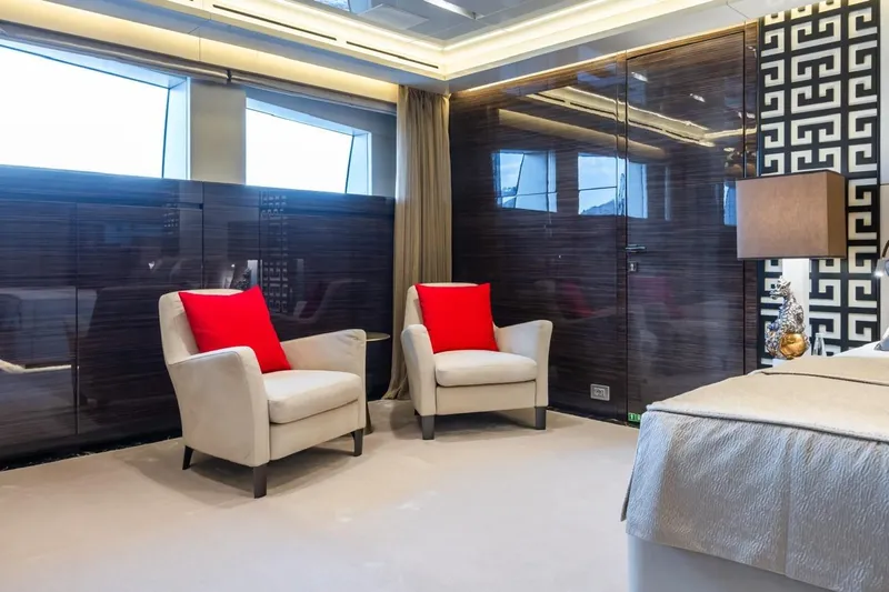 Zig Zag Ocean Yacht Photos Pics Luxurious yacht interior with modern decor, featuring beige armchairs and red cushions, Admiral 45 METERS 2014.