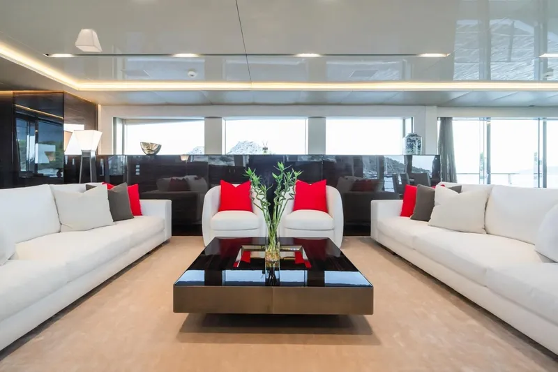 Zig Zag Ocean Yacht Photos Pics Luxurious yacht interior with modern decor, featuring white sofas and red cushions, Admiral 45 Meters 2014.