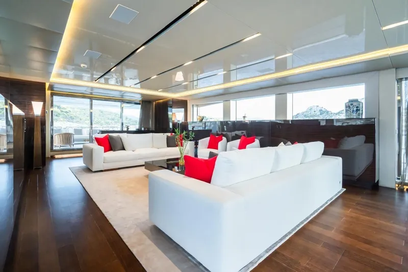 Zig Zag Ocean Yacht Photos Pics Luxurious yacht interior with white sofas, red cushions, and modern decor, Admiral 45 METERS, 2014.
