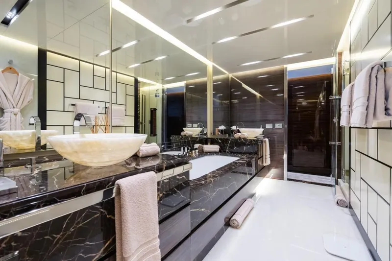 Zig Zag Ocean Yacht Photos Pics Luxurious yacht bathroom with marble countertops, modern fixtures, and elegant lighting, Admiral 45 Meters, 2014.