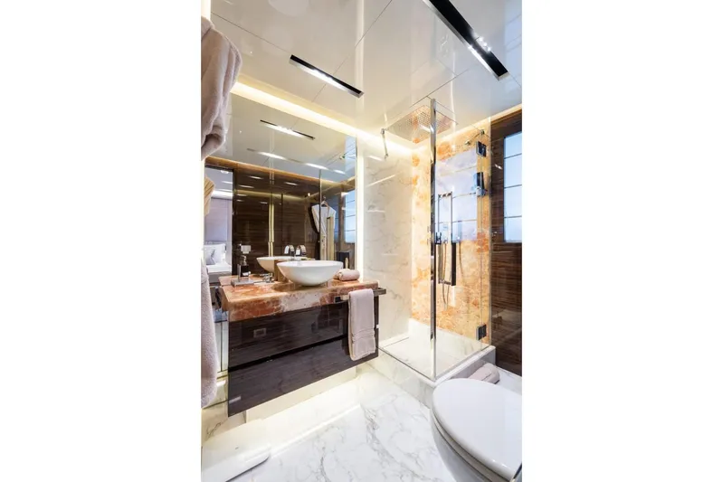 Zig Zag Ocean Yacht Photos Pics Luxurious yacht bathroom with marble accents, glass shower, and modern fixtures on Admiral 45 METERS, 2014.