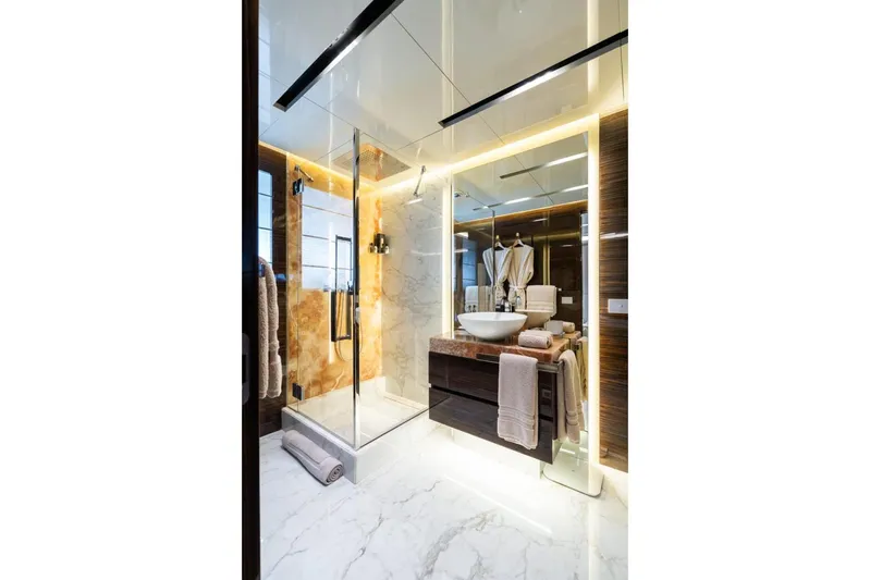Zig Zag Ocean Yacht Photos Pics Luxurious yacht bathroom with marble accents, glass shower, and elegant lighting, Admiral 45 Meters, 2014.