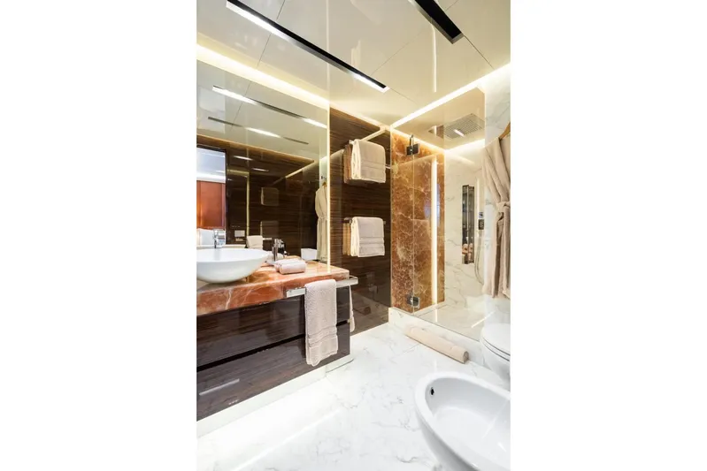 Zig Zag Ocean Yacht Photos Pics Luxurious yacht bathroom with marble accents, modern fixtures, and elegant lighting, Admiral 45 Meters, 2014.