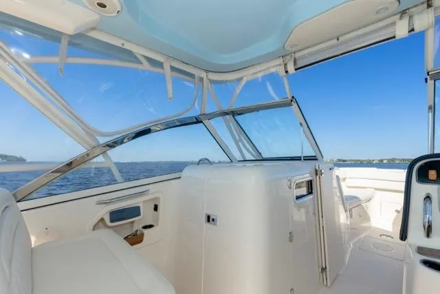  Yacht Photos Pics 2017 Grady-White Freedom 307 boat interior with ocean view and clear blue sky.