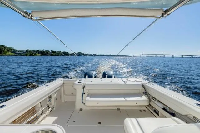  Yacht Photos Pics 2017 Grady-White Freedom 307 boat cruising on a sunny day, view from the deck.