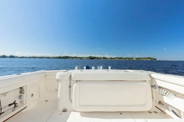  Yacht Photos Pics 2017 Grady-White Freedom 307 boat on open water under clear blue sky.