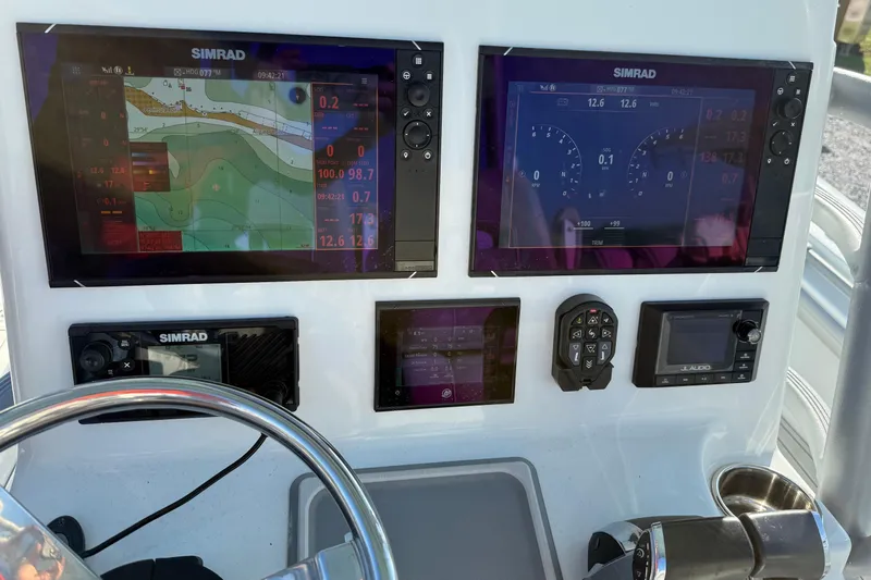  Yacht Photos Pics Control panel of 2021 Costa Custom Boats 264 HC with Simrad navigation displays.