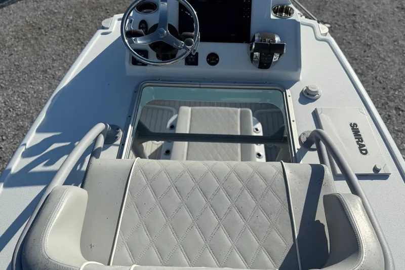  Yacht Photos Pics 2021 Costa Custom Boats 264 HC helm with steering wheel and Simrad electronics.