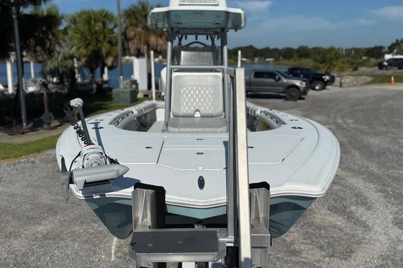  Yacht Photos Pics 2021 Costa Custom Boats 264 HC on trailer, parked near waterfront with palm trees.