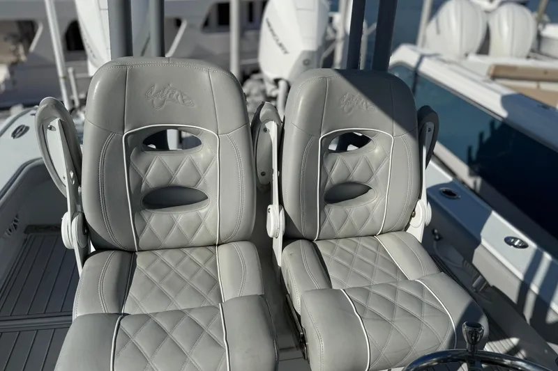  Yacht Photos Pics Luxurious seating on 2021 Costa Custom Boats 264 HC, featuring elegant diamond-stitched upholstery.