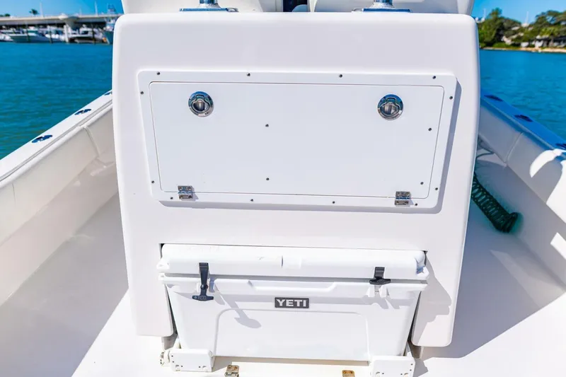  Yacht Photos Pics 2022 Conch 27 boat interior with Yeti cooler on deck.