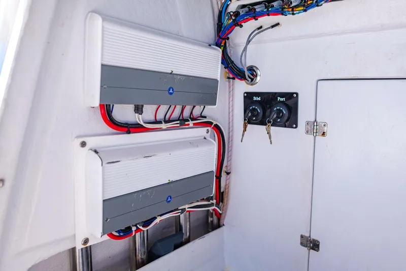  Yacht Photos Pics Electrical panel and wiring inside a 2022 Conch 27 boat.