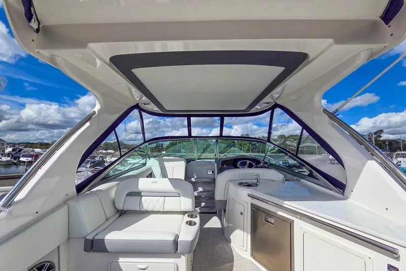  Yacht Photos Pics 2026 Regal 33 XO yacht interior with luxurious seating and modern amenities.