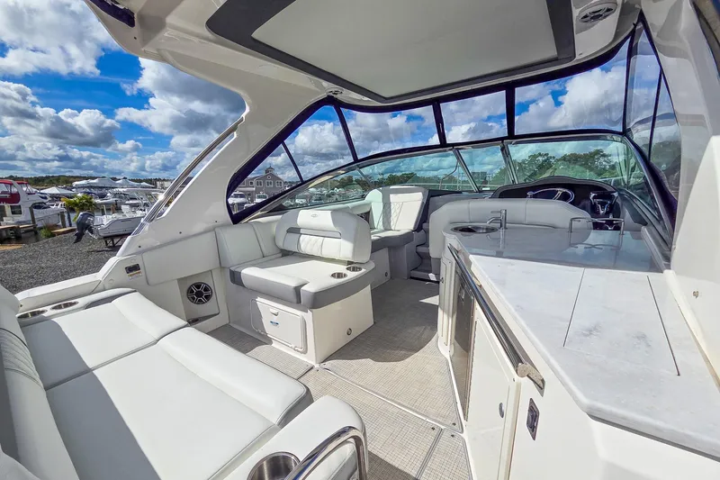  Yacht Photos Pics Luxurious interior of 2026 Regal 33 XO yacht with plush seating and modern amenities.