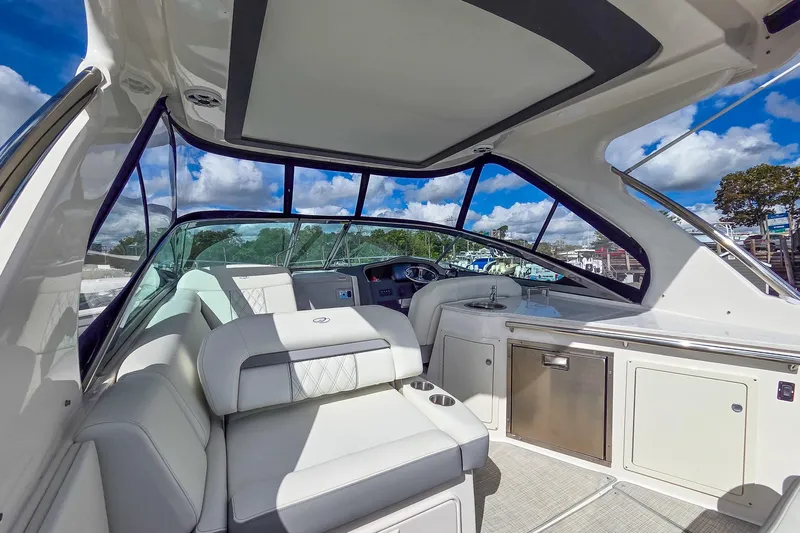  Yacht Photos Pics 2026 Regal 33 XO yacht interior with luxurious seating and modern amenities.