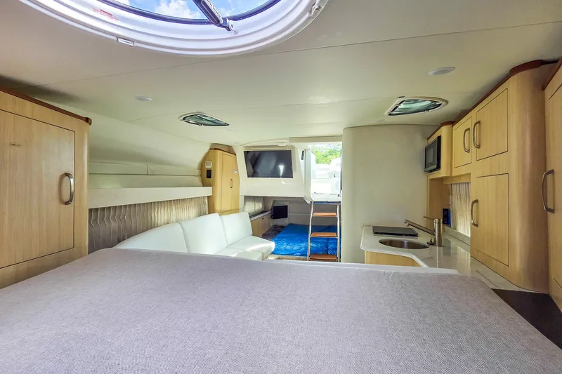  Yacht Photos Pics Luxurious interior of 2026 Regal 33 XO yacht with modern amenities and stylish design.