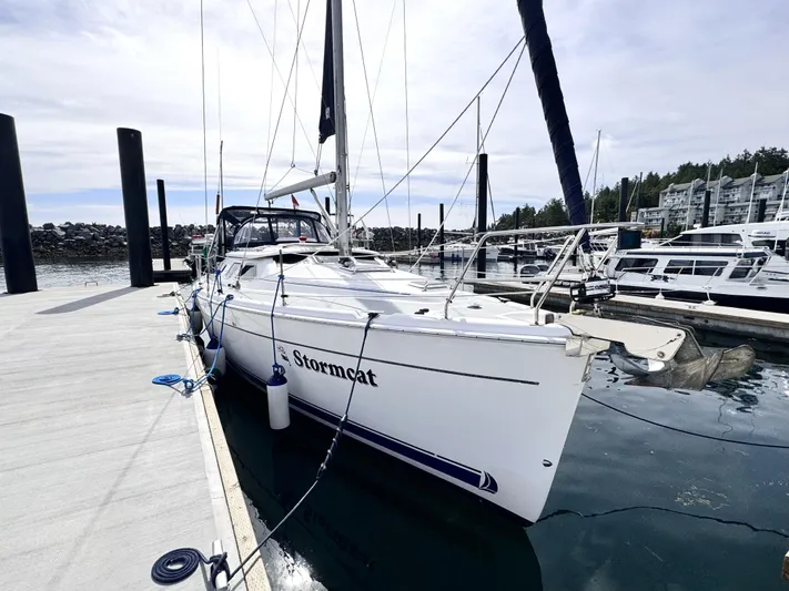 Stormcat Yacht Photos Pics 2006 Hunter 41 Deck Salon sailboat docked at marina, named "Stormcat."