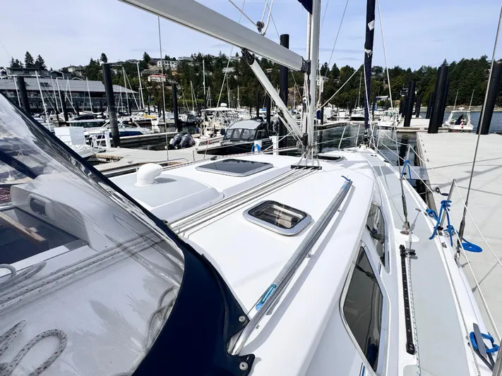 Stormcat Yacht Photos Pics 2006 Hunter 41 Deck Salon yacht docked at a marina, showcasing sleek design and spacious deck.