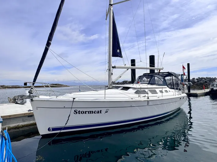 Stormcat Yacht Photos Pics 2006 Hunter 41 Deck Salon sailboat docked at marina under clear sky.