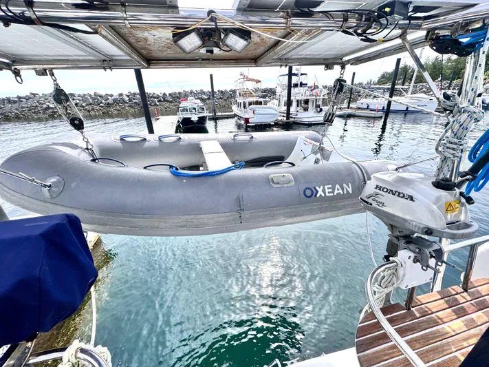 Stormcat Yacht Photos Pics Inflatable dinghy with Honda motor on Hunter 41 Deck Salon, 2006, docked at marina.