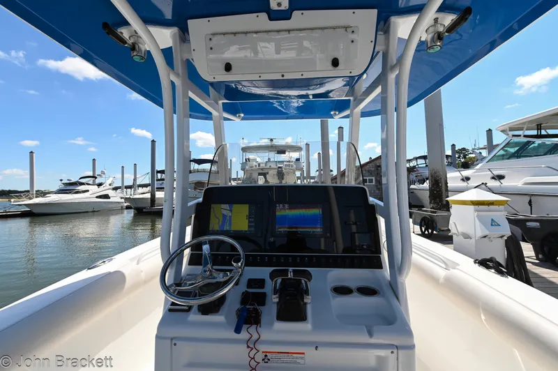 Sea Level Yacht Photos Pics 2014 Sea Hunt Gamefish 30 boat dashboard with navigation equipment at marina.