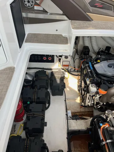  Yacht Photos Pics 2016 Cruisers Yachts 338SS engine compartment with batteries and fire extinguisher.