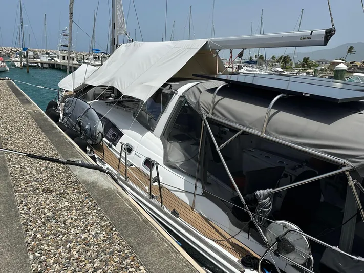  Yacht Photos Pics 2014 Beneteau Oceanis 50 yacht docked at marina with protective covers.