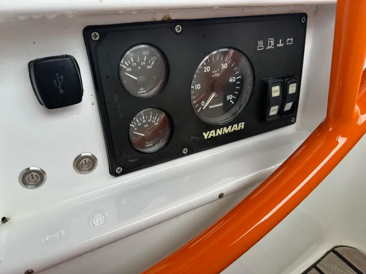  Yacht Photos Pics Control panel of a 2014 Beneteau Oceanis 50 sailboat with Yanmar engine gauges.
