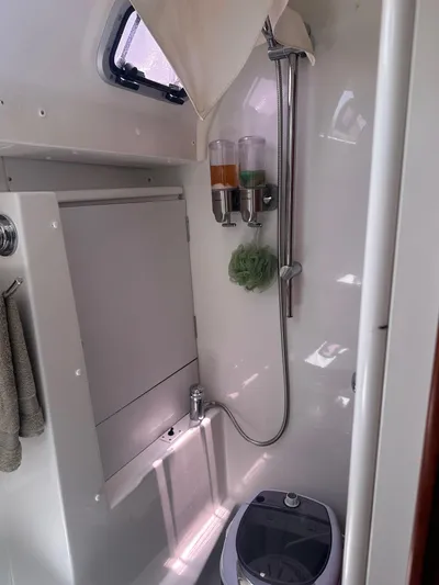  Yacht Photos Pics Beneteau Oceanis 50 yacht bathroom with shower, dispensers, and compact design, 2014 model.