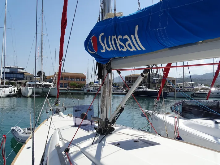 Sea Sea Rider Yacht Photos Pics 2017 Jeanneau Sun Odyssey 389 sailboat docked in a marina, featuring Sunsail branding.