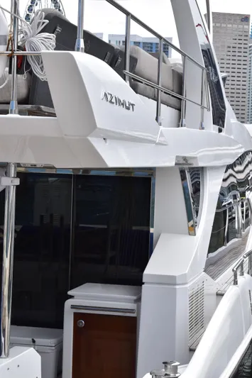  Yacht Photos Pics 2018 Azimut Flybridge yacht docked, showcasing sleek design and modern features.