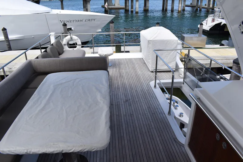  Yacht Photos Pics Azimut Flybridge 2018 yacht deck with seating and ocean view.