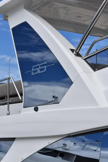  Yacht Photos Pics 2018 Azimut Flybridge yacht, sleek design with modern architecture against a blue sky.