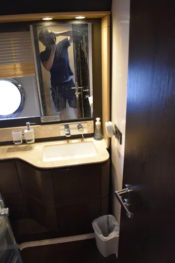  Yacht Photos Pics 2018 Azimut Flybridge yacht bathroom with modern fixtures and mirror.