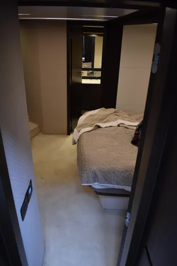  Yacht Photos Pics 2018 Azimut Flybridge yacht interior bedroom with modern design and cozy bedding.